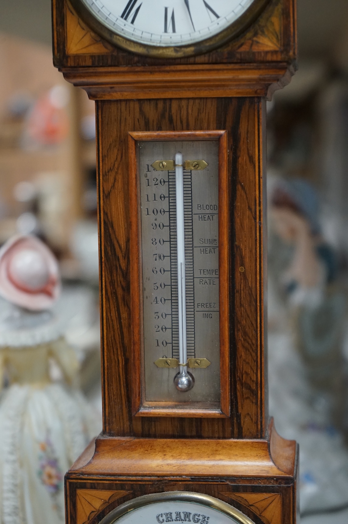 A miniature inlaid rosewood longcase clock with French movement and integral aneroid barometer and thermometer, the dial inscribed Aldis, Pimlico, 47cm high